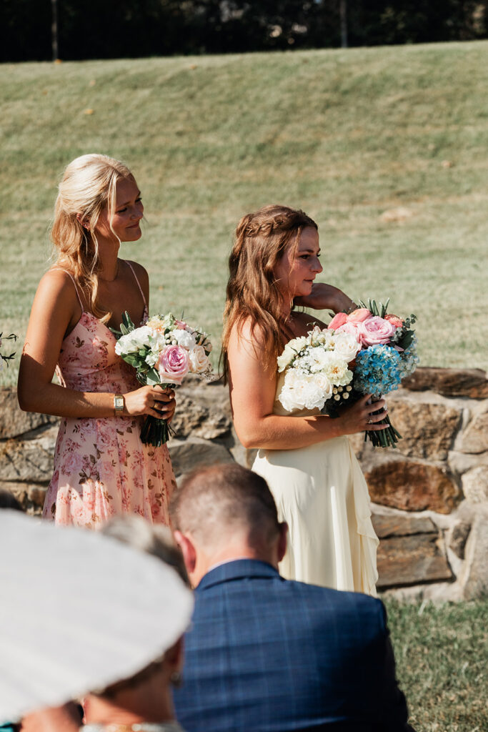 bride sisters during ceremony